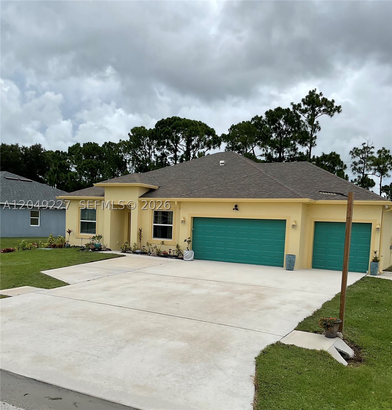 6157 NW Gatun Dr — photo
