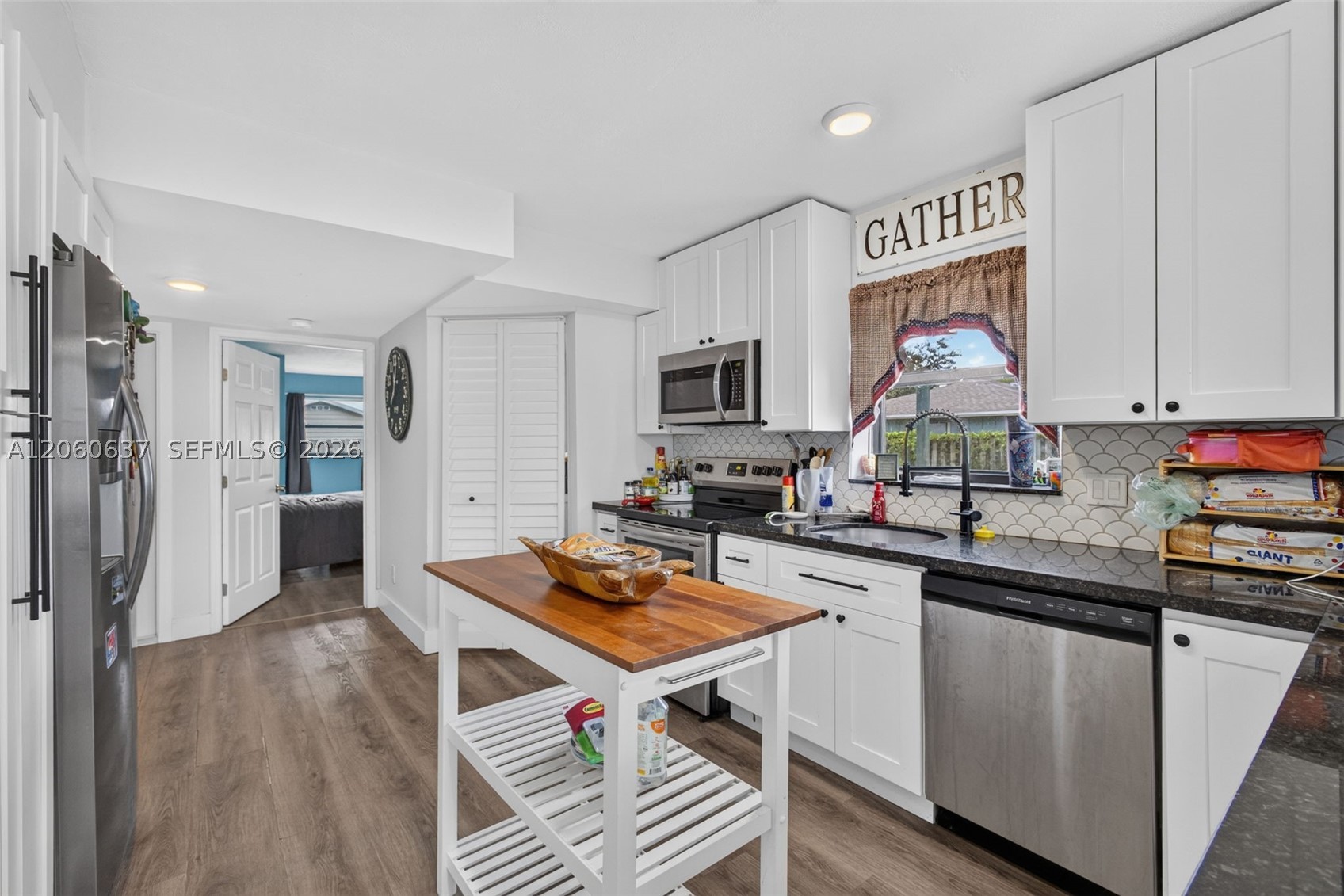 6187 Kendrick St — photo