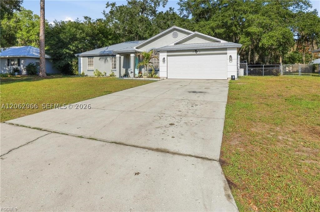 4022 E Sunflower Circle, La Belle, FL 33935 — photo 2