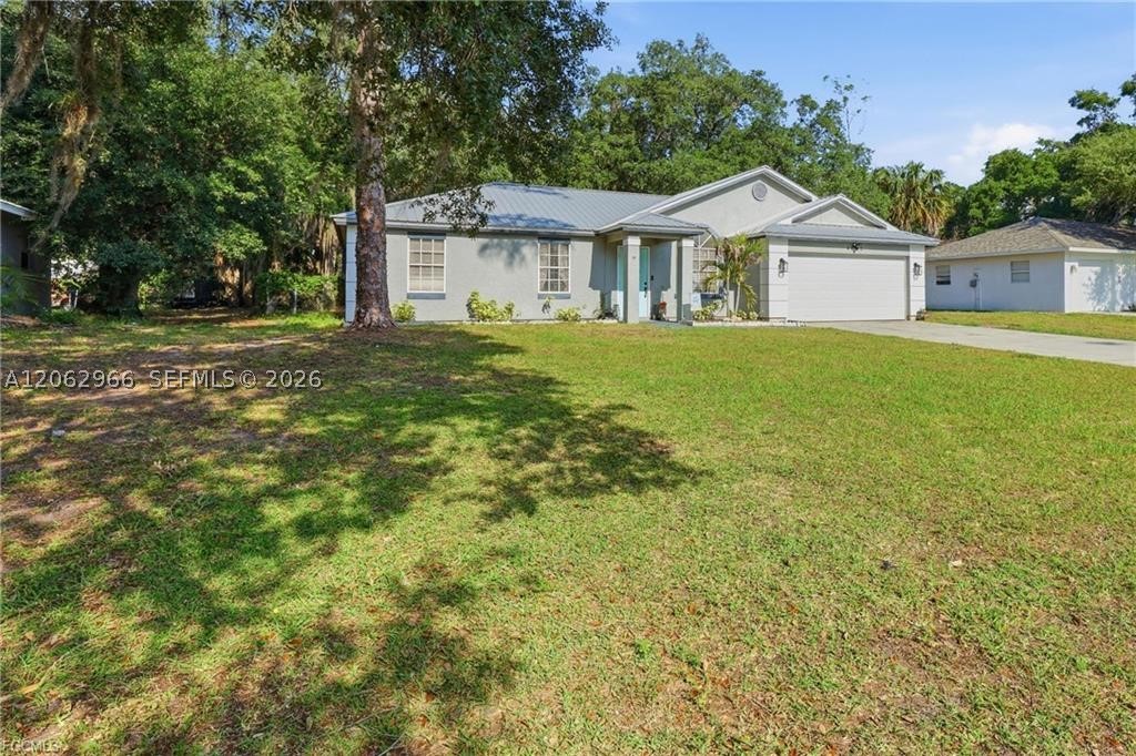 4022 E Sunflower Circle, La Belle, FL 33935 — photo 3