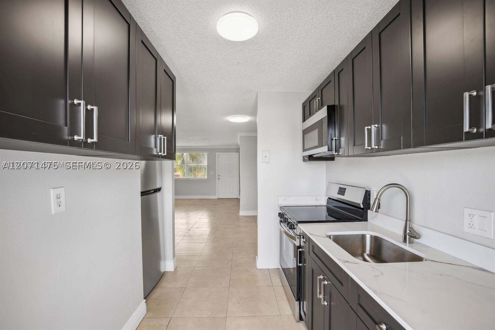 850 E Commercial Blvd 214B — photo
