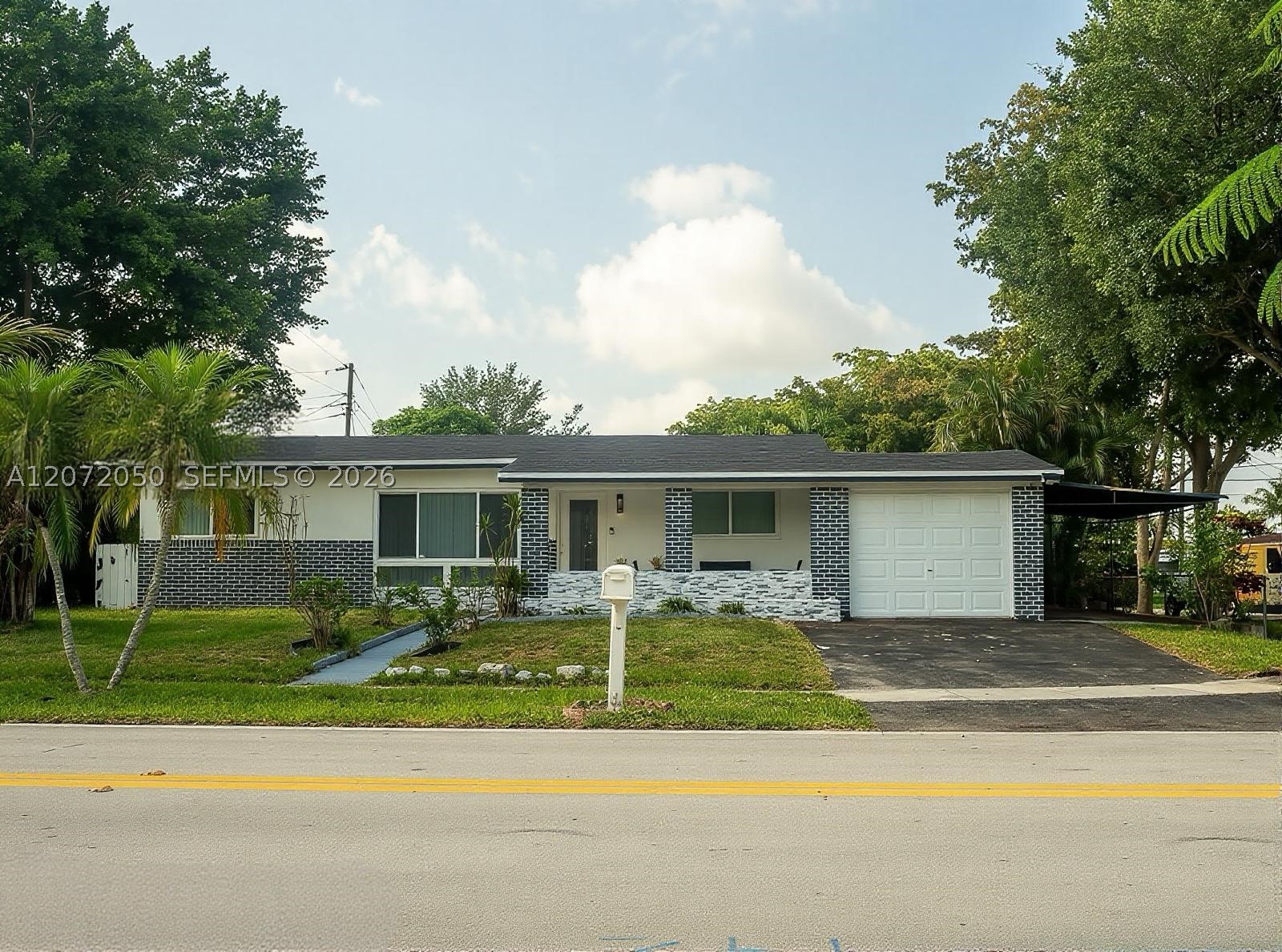 5090 SW 9th Ct — photo