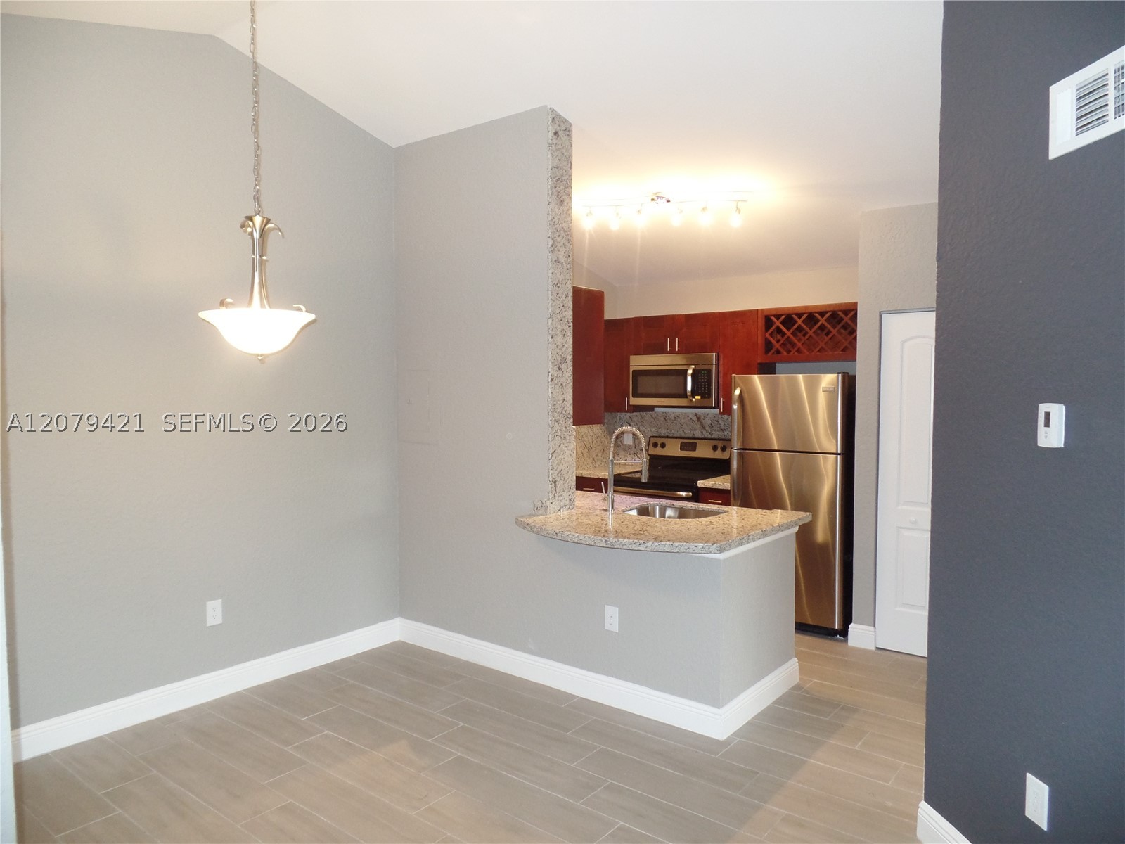 2881 N Oakland Forest Dr 311 — photo