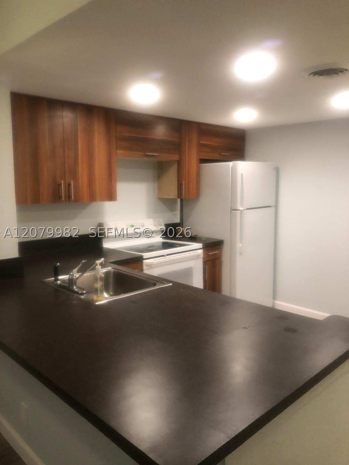 3700 N Pine Island Rd 202 — photo
