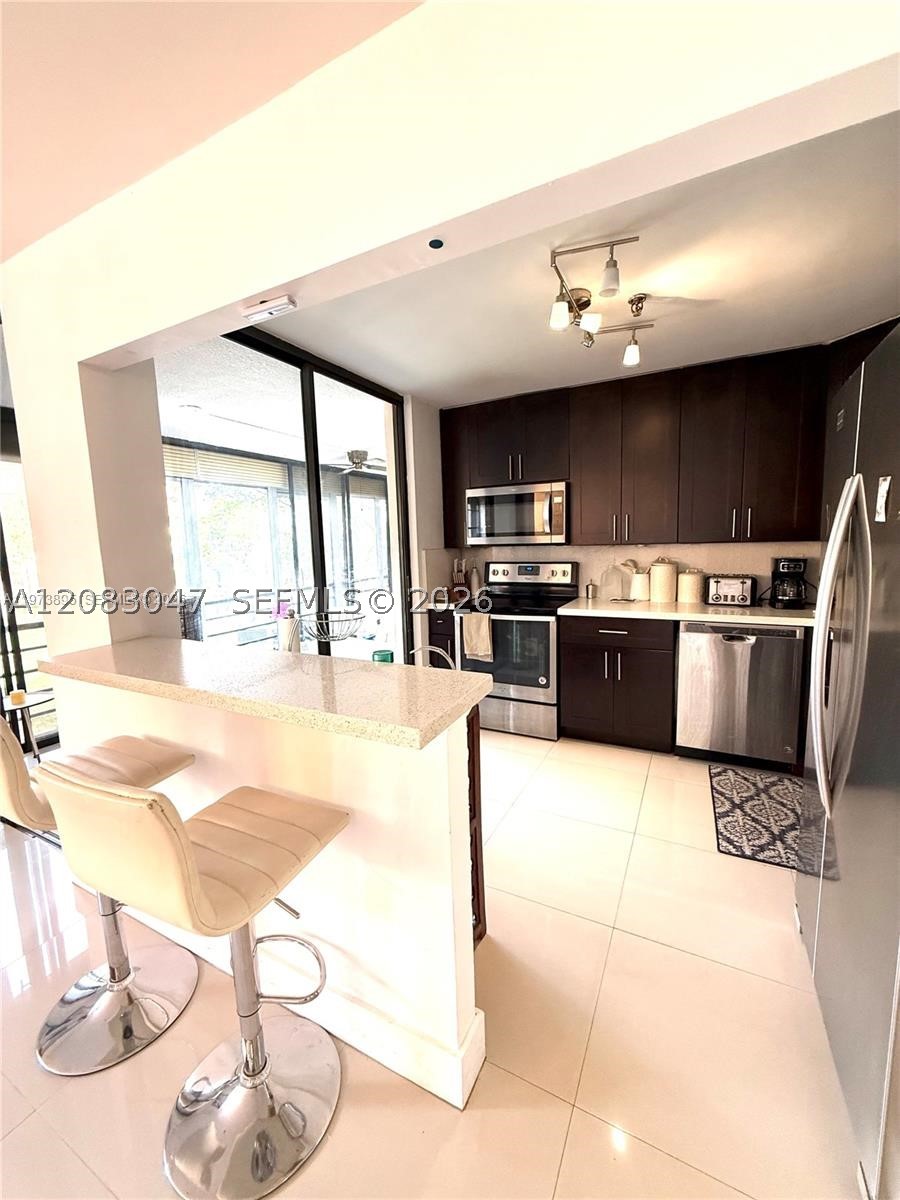 671 NE 195th St 227-E — photo