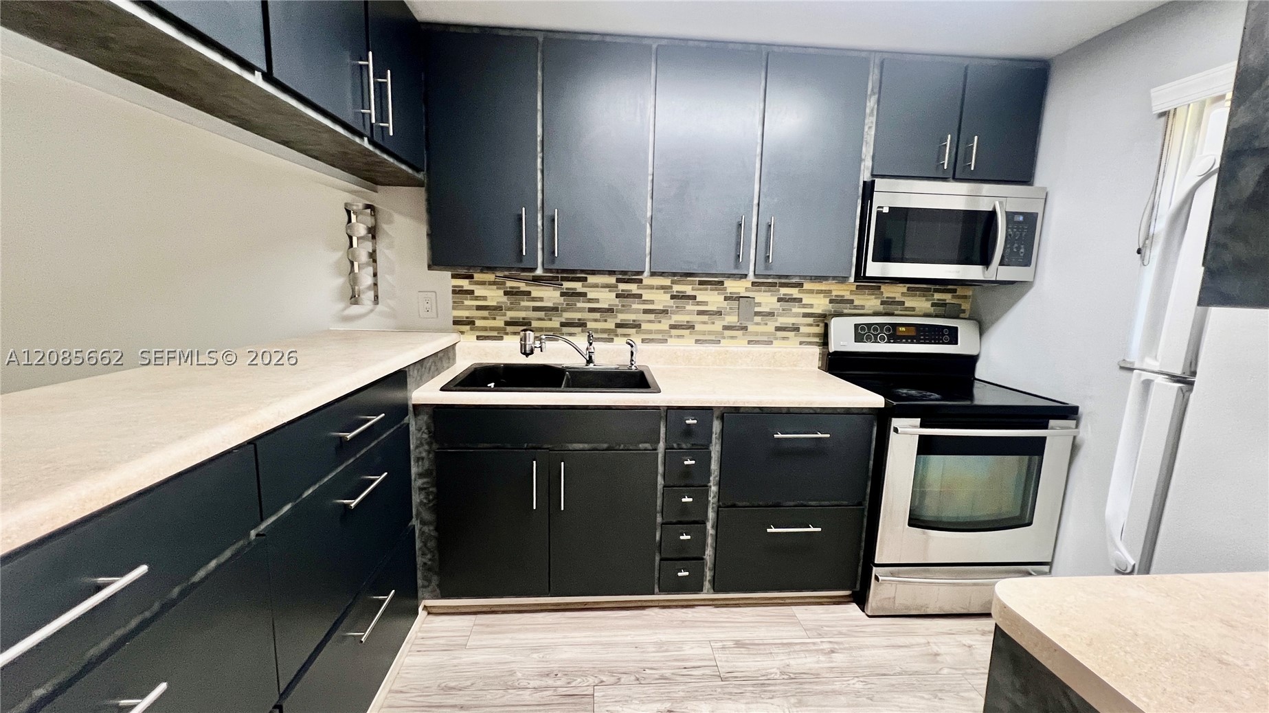 7610 Stirling Rd 103B — photo