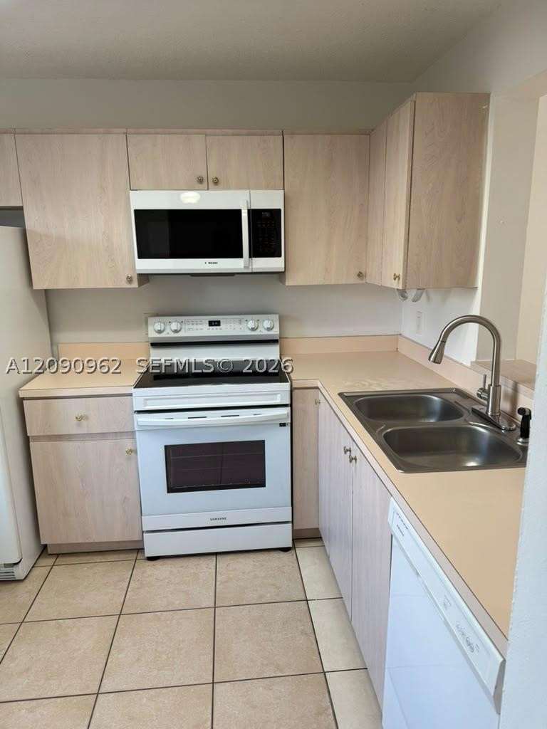 8740 N Sherman Cir 102 — photo
