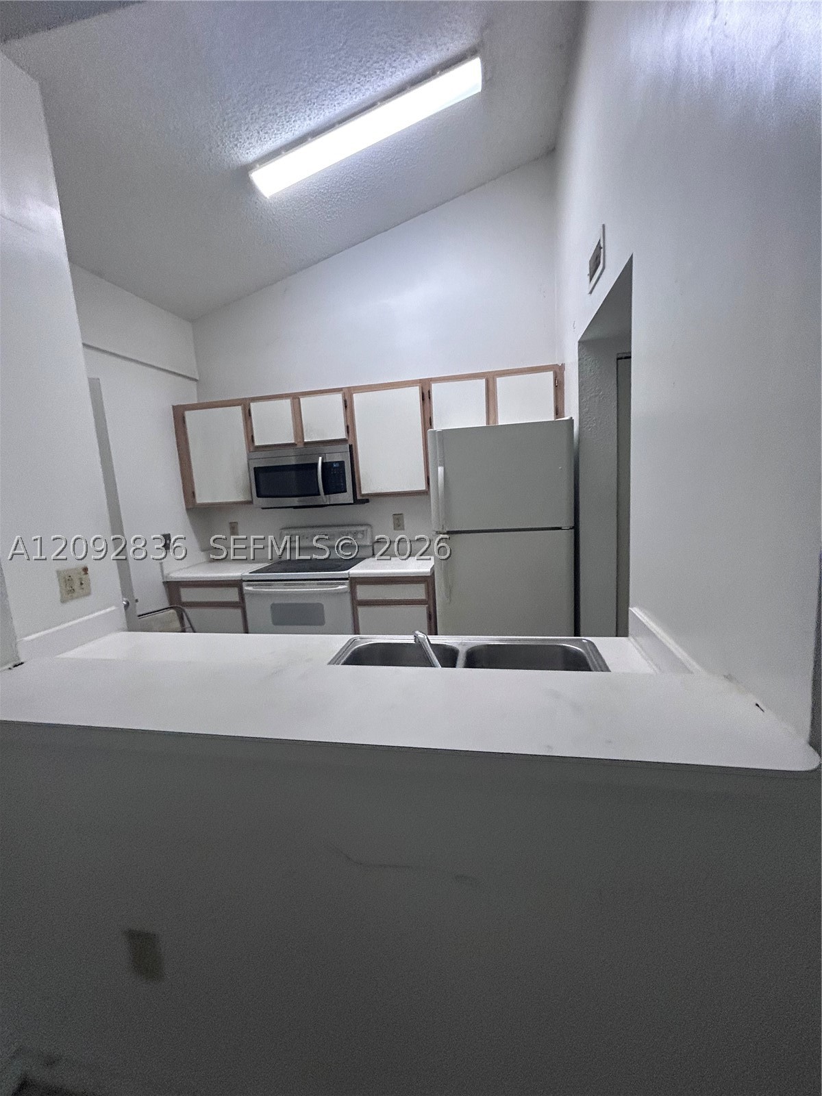 2890 N Oakland Forest Dr 202 — photo