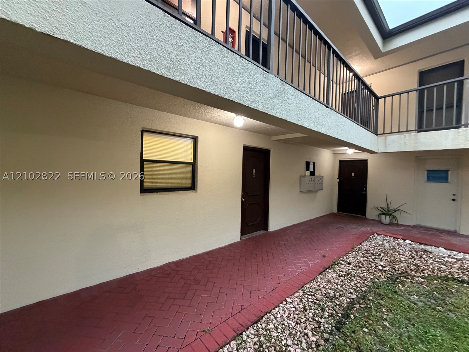 2300 S Cypress Bend Dr Unit 102 — photo