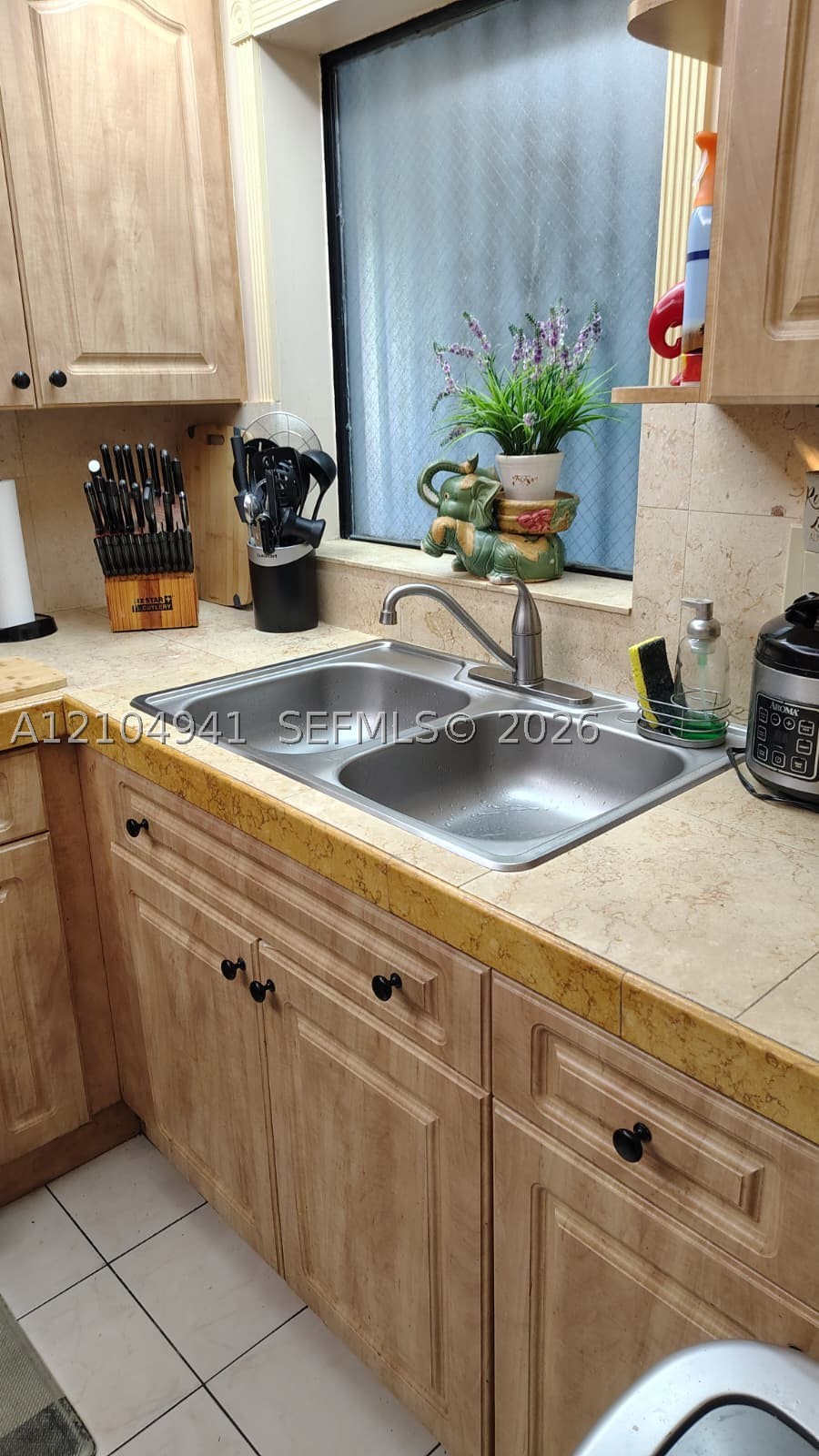 6251 W 24th Ave Unit 201-10 — photo