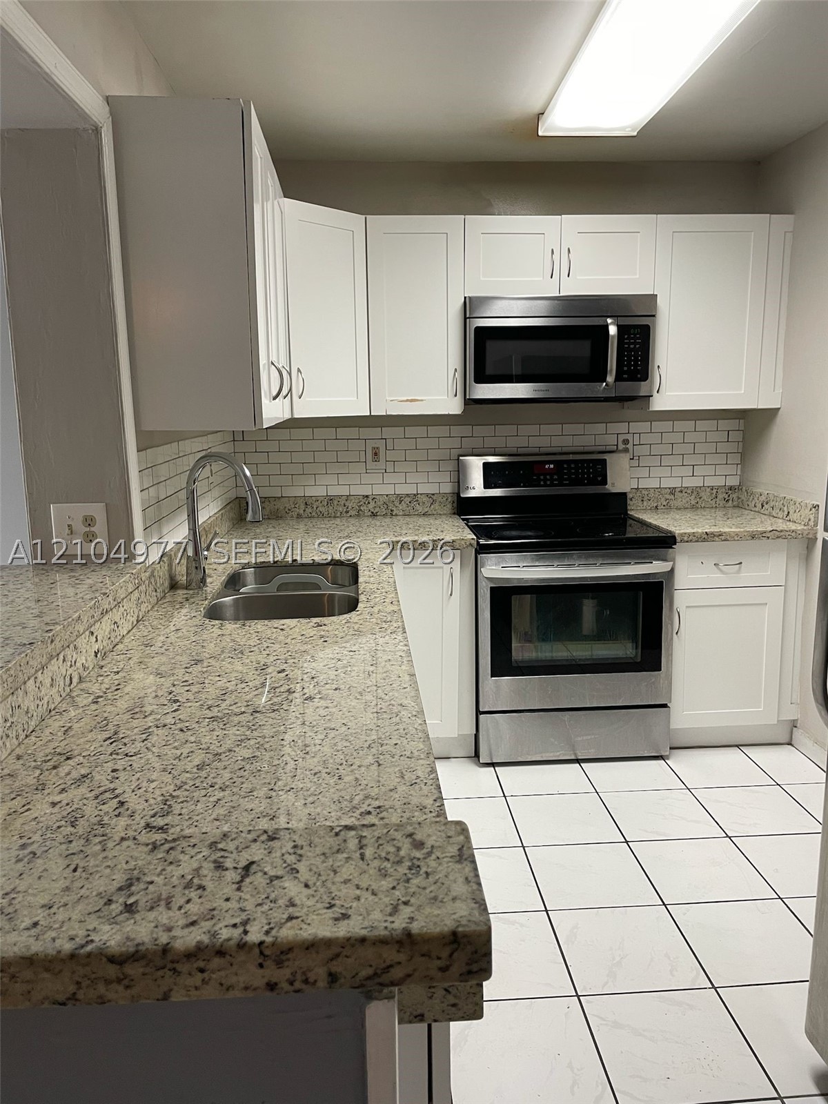 5775 W 20th Ave Unit 210 — photo