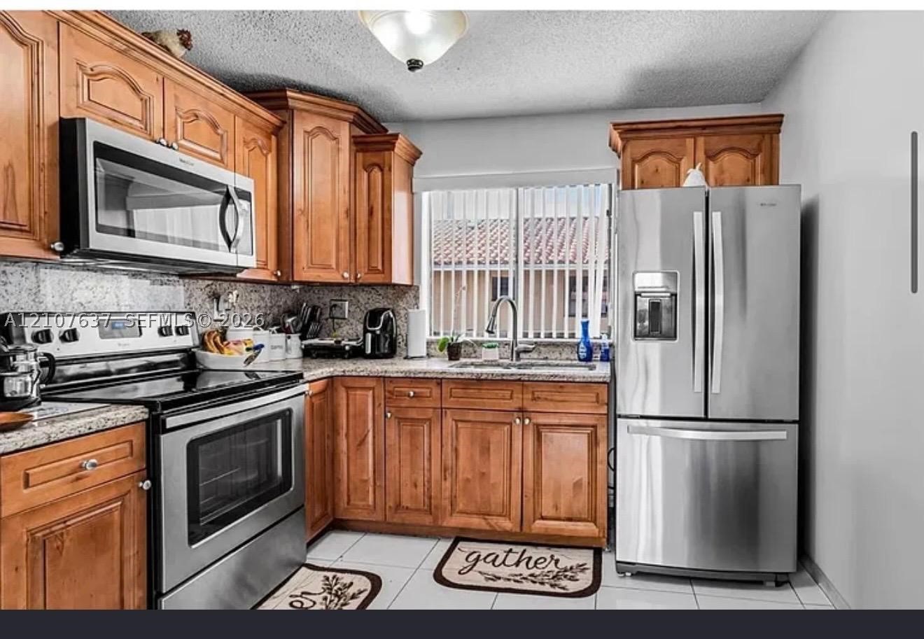2730 W 61st Pl Unit 204 — photo