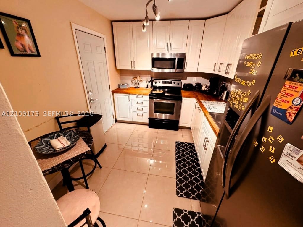 9500 W Bay Harbor Dr Unit 6G — photo