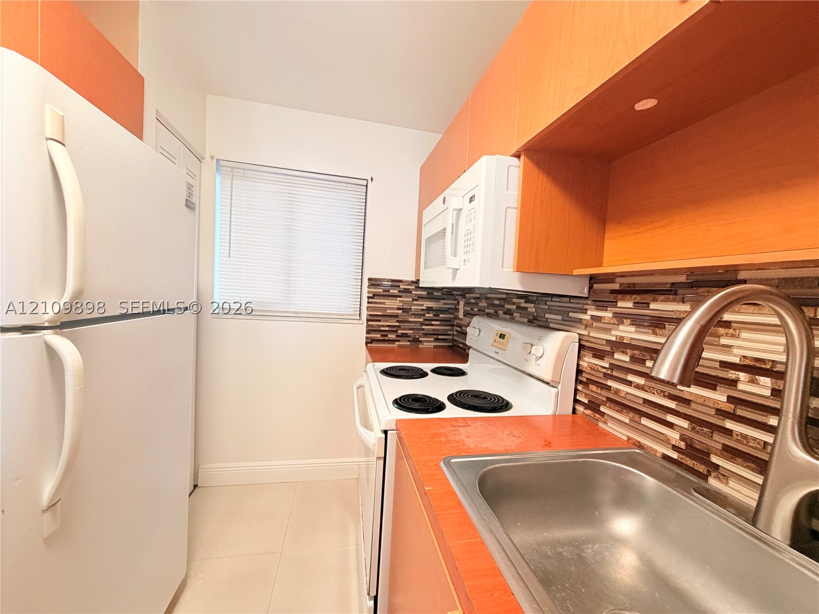 6055 W 19th Ave Unit 412 — photo