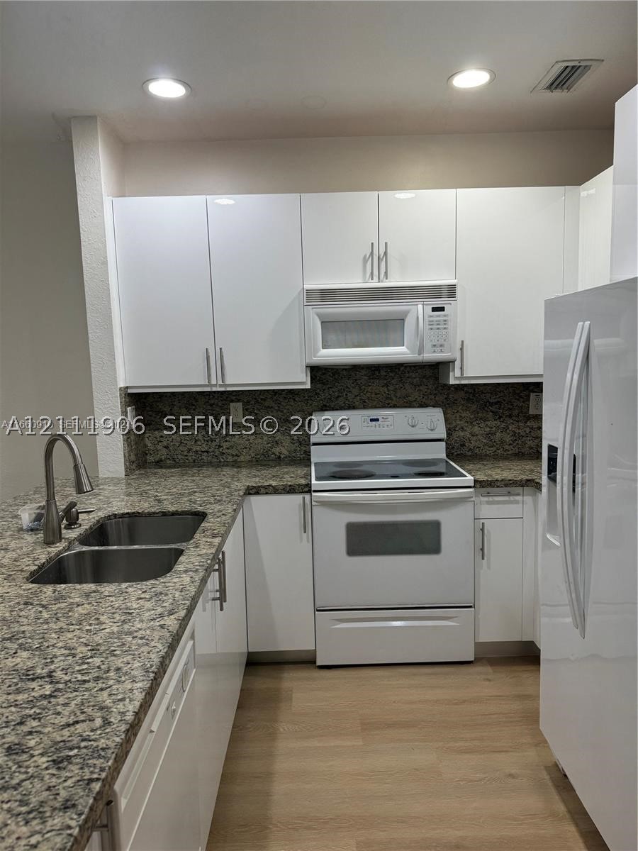 5737 NW 114th Path Unit 102 — photo