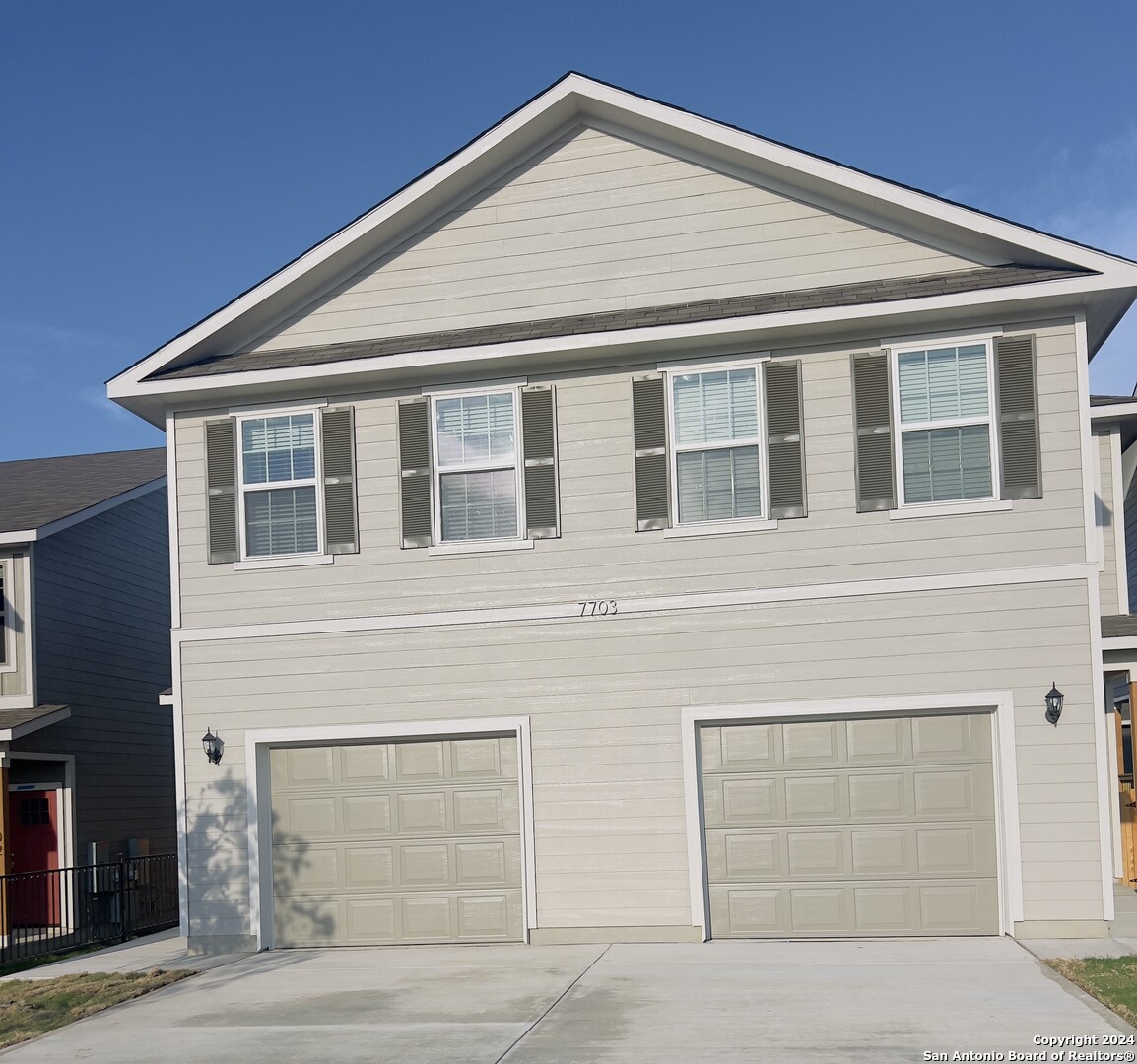 7703 Briarwood Pass 102 — photo