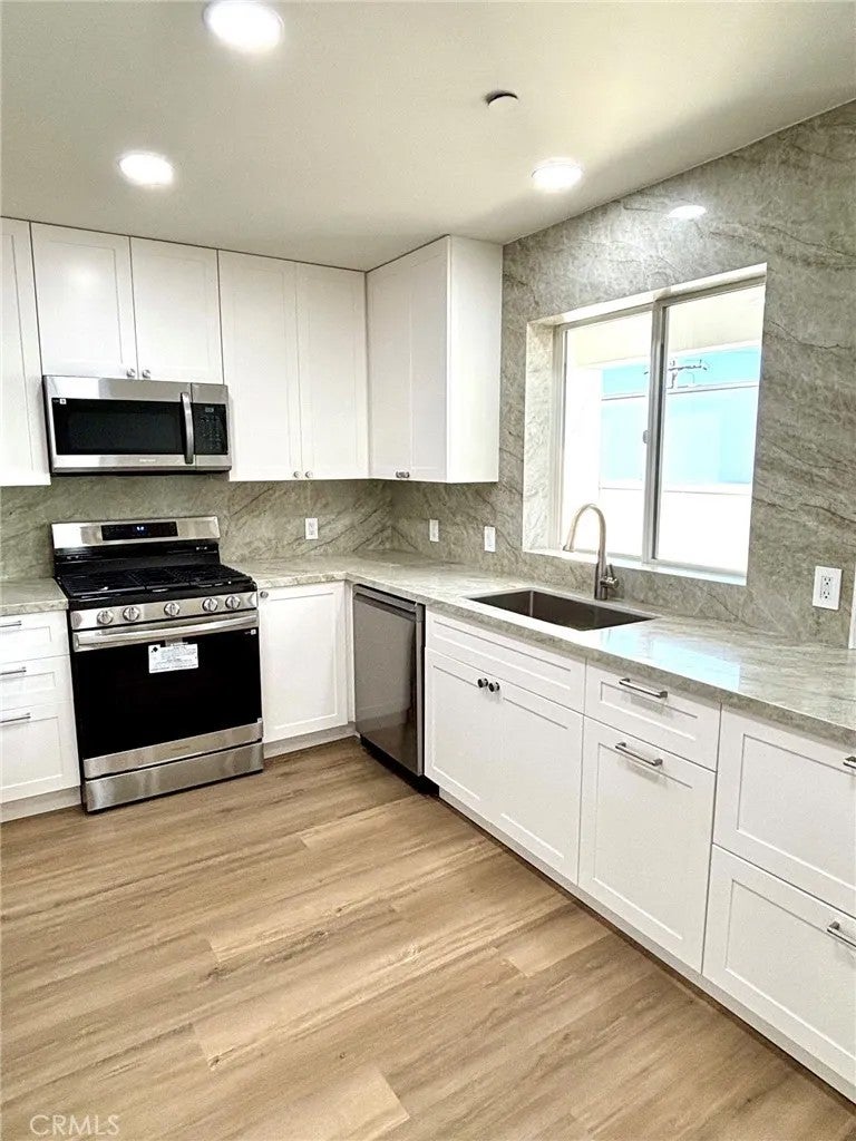 310 E Grand Avenue 208 — photo