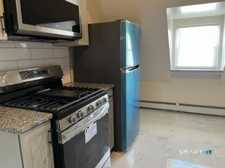 Home in Hartford, CT 06114 — photo 3
