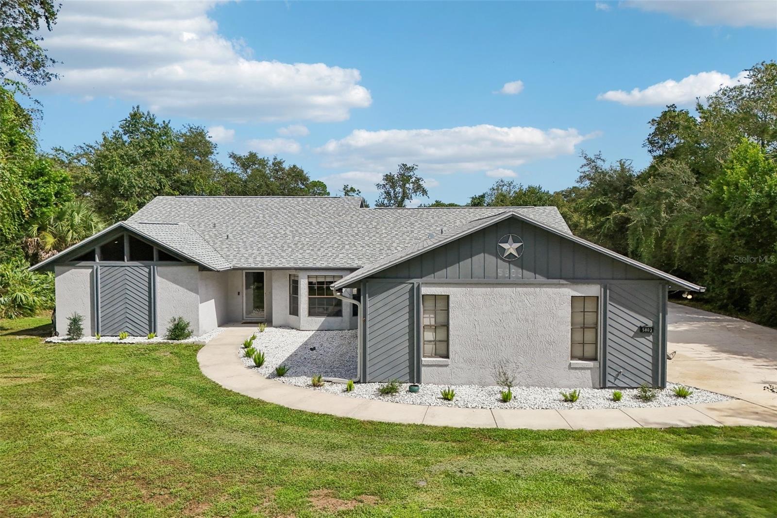 5803 Spruce Creek Woods Dr — photo