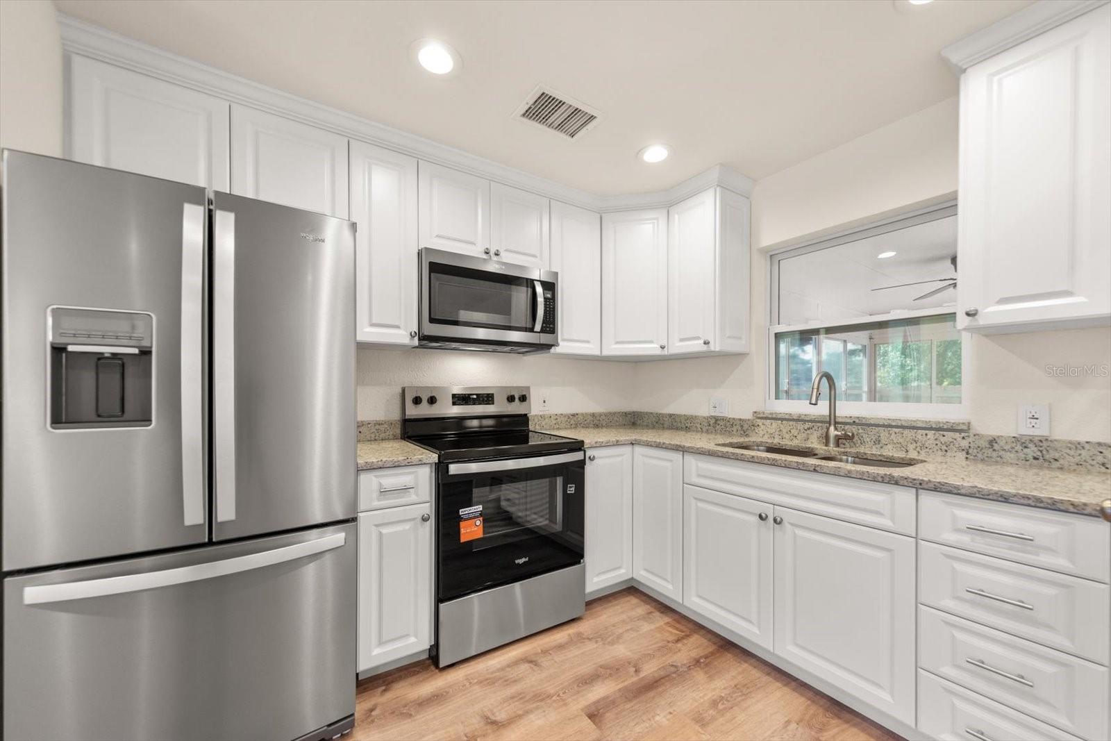 Home in PINELLAS PARK, FL 33782 — photo 3