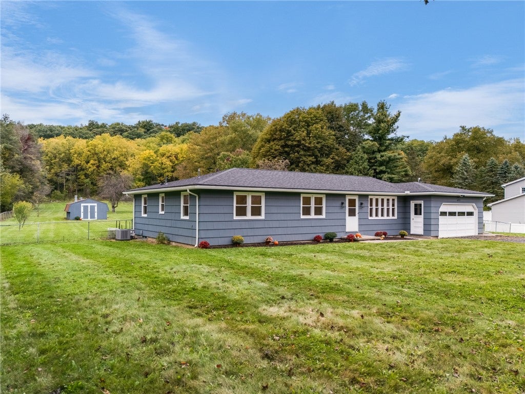 6933 E River Road — photo