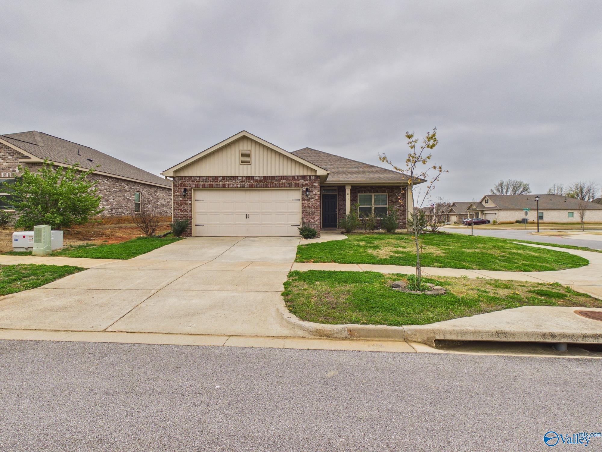 7011 NW Oakleigh Rose Drive — photo